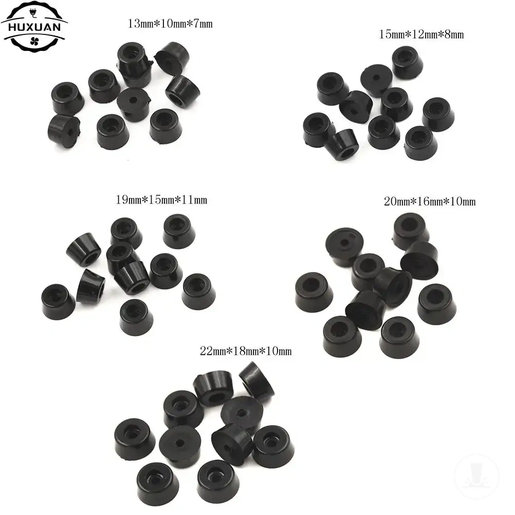 Schwarze Gummi-Möbelfußpads für Tisch- und Stuhlfüße auf Fliesenböden.